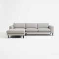 Divano angolare in tessuto grigio con chaise longue