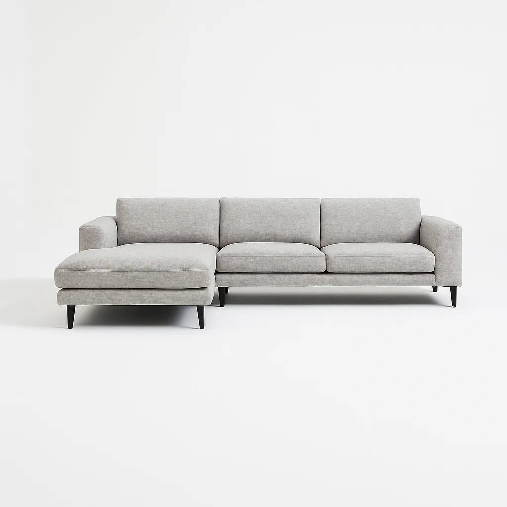 Divano angolare in tessuto grigio con chaise longue