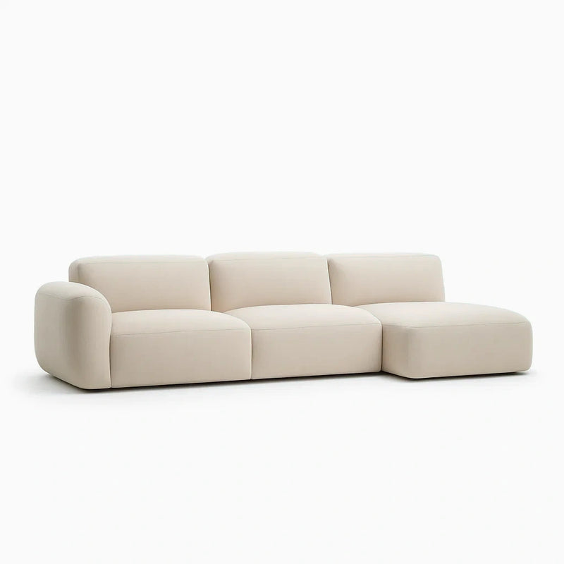 Divano modulare a 3 posti in tessuto beige con chaise longue